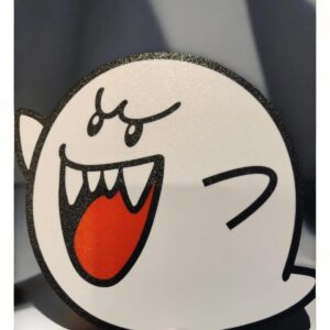 Coussin lumineux 3D blanc avec dessin de visage expressif, bordure noire scintillante, permet d'ajouter une touche d'originalité à la décoration intérieure.