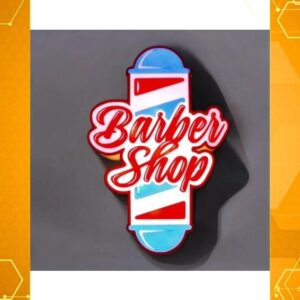 Neon en forme de coupe de rasage avec écrit "Barber Shop" en lettres cursives rouges, illuminé en LED pour décoration intérieure ou vitrine.