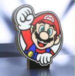 Lampe LED 3D de Mario illustrée en LED avec personnage emblématique de Nintendo, création lumineuse et colorée pour décoration ou cadeau.