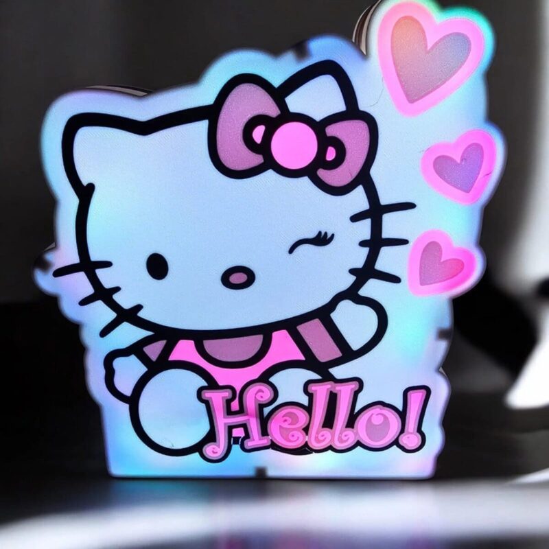 Luminaire LED 3D avec personnage Hello Kitty, design lumineux et coloré avec cœurs roses, idéale pour une décoration jeune et tendance, création lumineuse originale pour chambre ou salon.