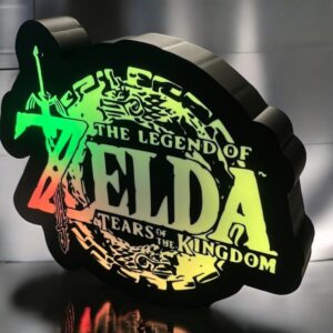 Lampe LED 3D "The Legend of Zelda" avec logo coloré, création lumineuse originale pour fans de jeux vidéo et décoration intérieure moderne.