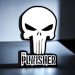 Design lumineux 3D de skull The Punisher avec éclairage LED pour décoration moderne et originale. Fabriqué par Infinity 3D Print, parfait pour personnaliser votre intérieur ou comme cadeau unique.