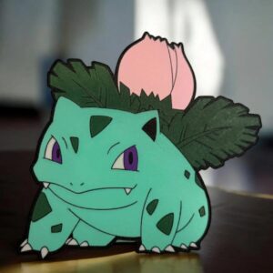 Panneau lumineux 3D de Bulbizarre, Pokémon, avec feuilles et pousse en LED, création artistique originale en impression 3D pour décoration lumineuse.