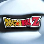 Logo de Dragon Ball Z en impression 3D avec éclairage LED, conçu par Infinity 3D Print, parfait pour décoration ou collection de fans de manga et anime, en matériau lumineux et coloré.