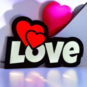 Lettres lumineuses 3D "LOVE" avec coeurs rouges, décoration LED moderne, créée par Infinity 3D Print pour une ambiance chaleureuse et romantique.