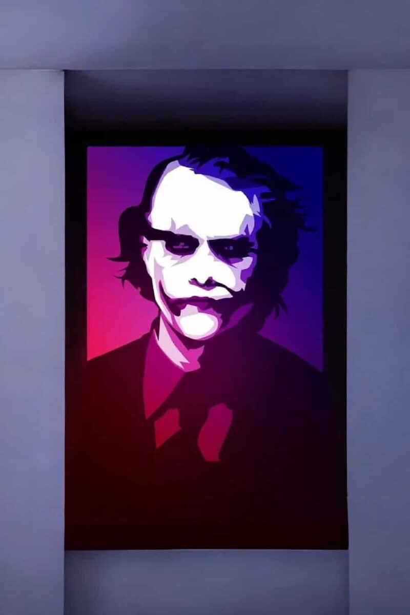 Portrait laserifié en 3D de Joker avec effets lumineux colorés LED.