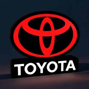 TOYOTA logo néon lumineux LED, signalétique rétroéclairée, création lumineuse 3D pour décoration intérieure ou extérieure, éclairage personnalisé, design lumineux moderne et élégant.