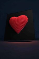 3. Lampes LED 3D en forme de cœur avec design lumineux et moderne, parfaites comme décoration intérieure ou cadeau, créant une ambiance chaleureuse et romantique.