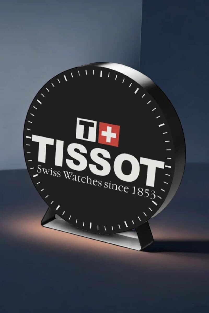 Tissu logo Tissot lumineux 3D, lampe LED design pour décoration intérieure, créative et moderne, idéale pour les amateurs d'horlogerie suisse.