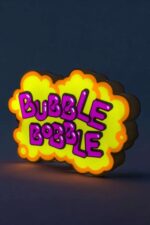 Colorful LED lamp with the phrase "BUBBLE BOBBLE" in bright purple letters on a yellow and orange cloud-shaped background, creating a vibrant, glowing decorative piece.