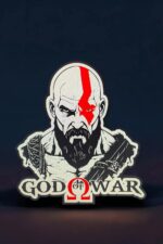 Silhouette de Kratos de God of War en sticker lumineux 3D avec éclairage LED, parfait pour la décoration gaming et les fans du jeu vidéo.