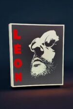 Lampe LED 3D avec illustration de visage et texte "LOVEL" en rouge, créant une décoration lumineuse moderne et personnalisée.