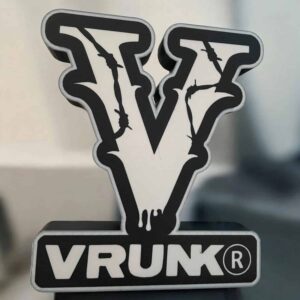 Véritable logo VRUNK 3D lumineux avec design artistique, création de lampes LED innovantes.