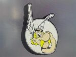 Sticker lumineux 3D représentant Astérix avec ses oreilles ailées et son expression malicieuse, conçu par Infinity 3D Print, parfait pour décoration ou collection de fans de la bande dessinée.