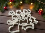 Surligneurs de biscuits et décorations en forme de Noël en impression 3D, parfaits pour créer des ambiances festives lors des fêtes de fin d'année.
